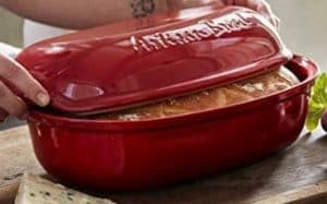 baking bread in ceramic loaf pan red image